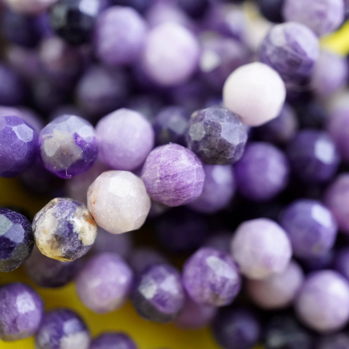 Sugilite (Round)(Micro)(Faceted)(4mm)(15"Strand)