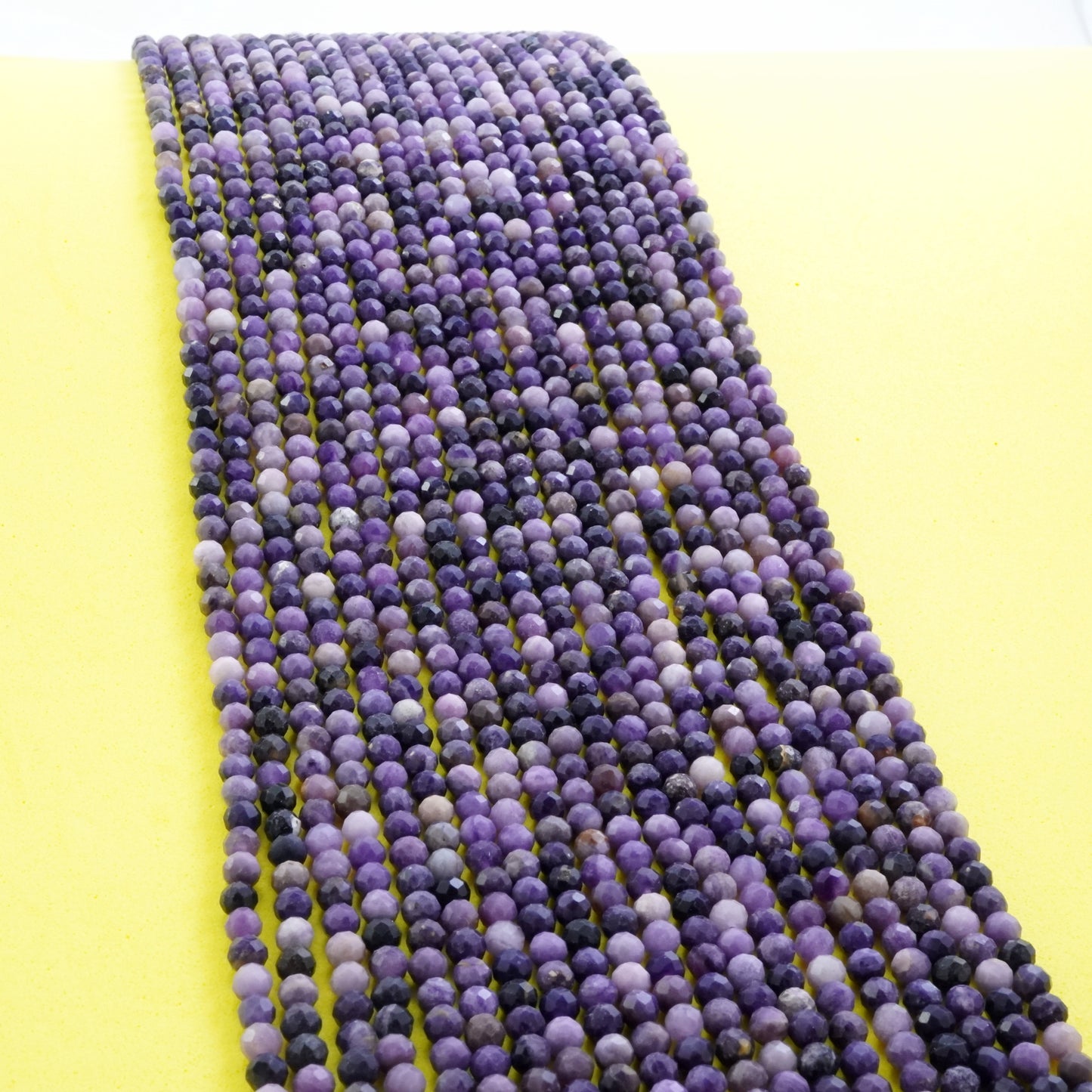 Sugilite (Round)(Micro)(Faceted)(4mm)(15"Strand)