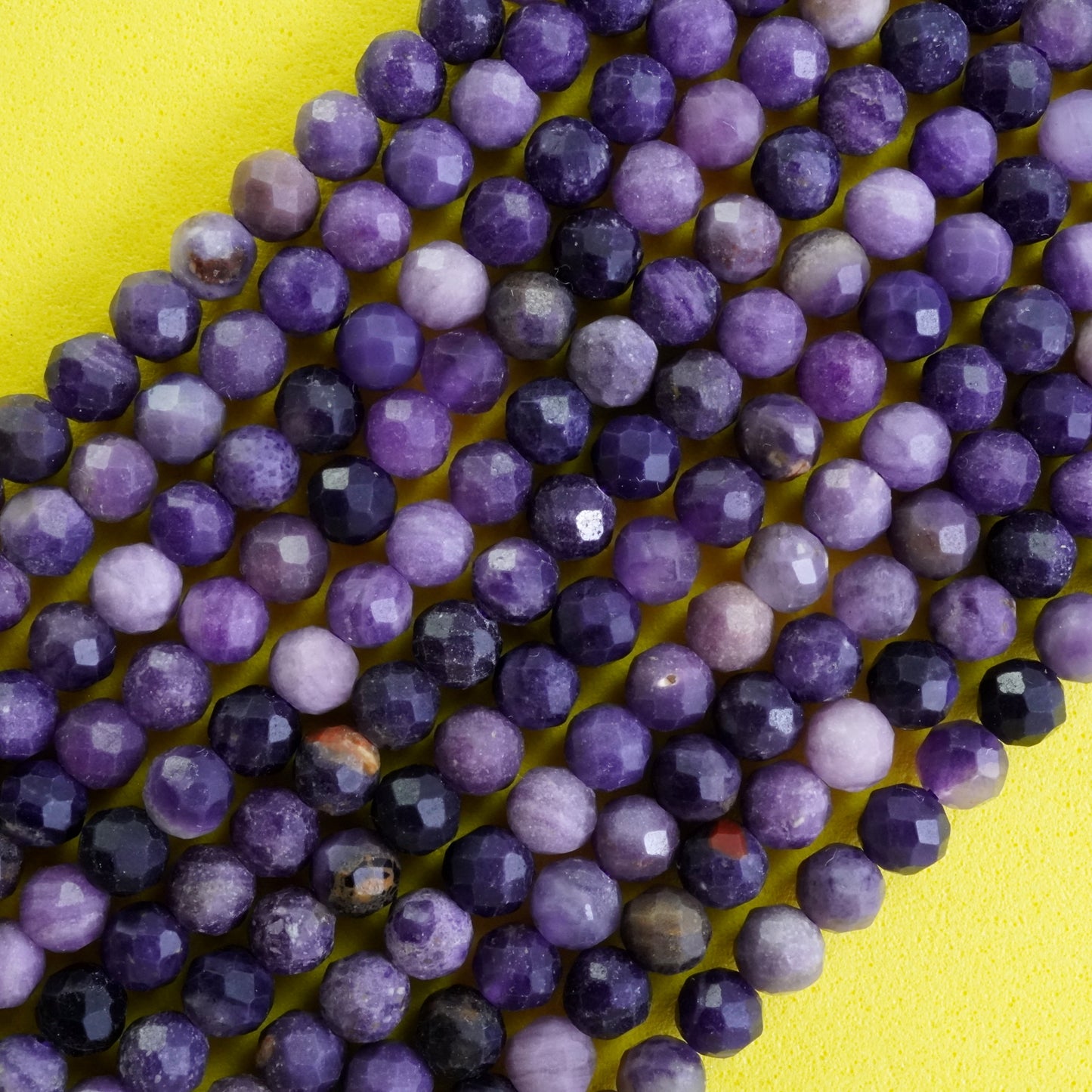 Sugilite (Round)(Micro)(Faceted)(4mm)(15"Strand)