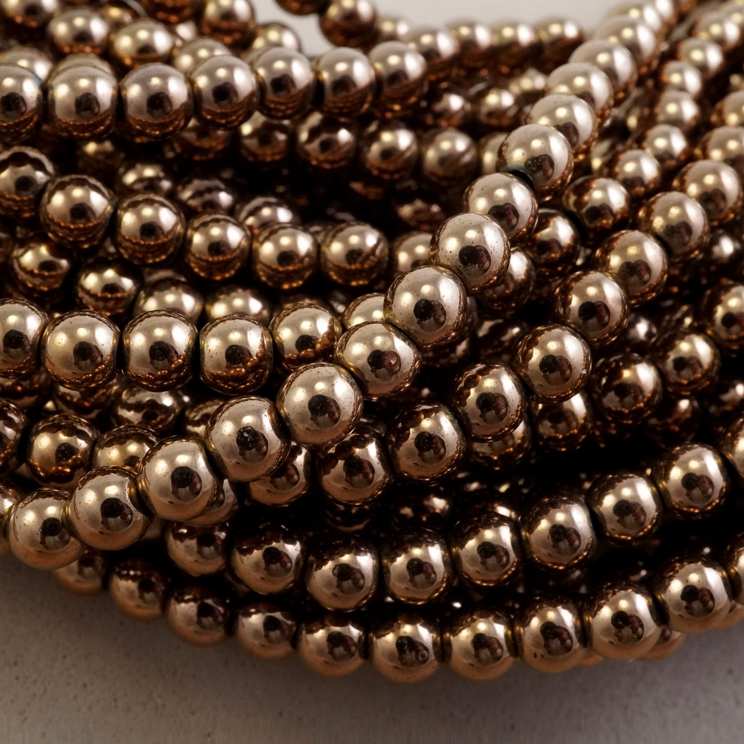 Hematite (Bronze)(Electroplated)(Round)(Smooth)(2mm)(3mm)(4mm) (6mm)(8mm)(10mm)(15.50"Strand)