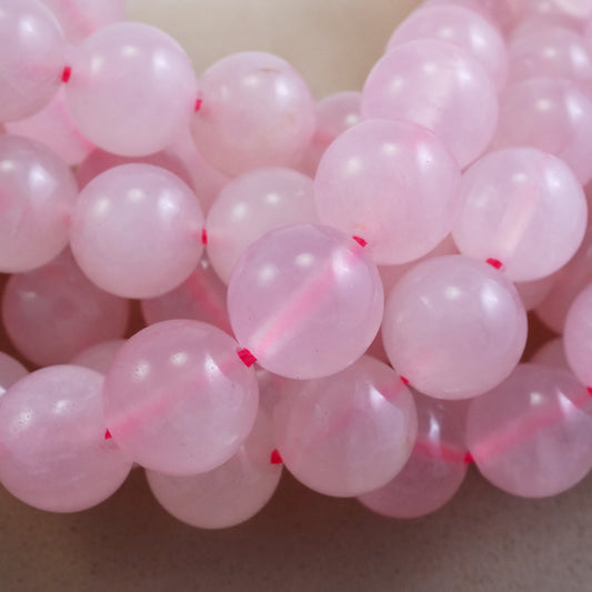 Rose Quartz (Round)(Smooth)(4mm)(6mm)(8mm)(10mm)(16"Strand)