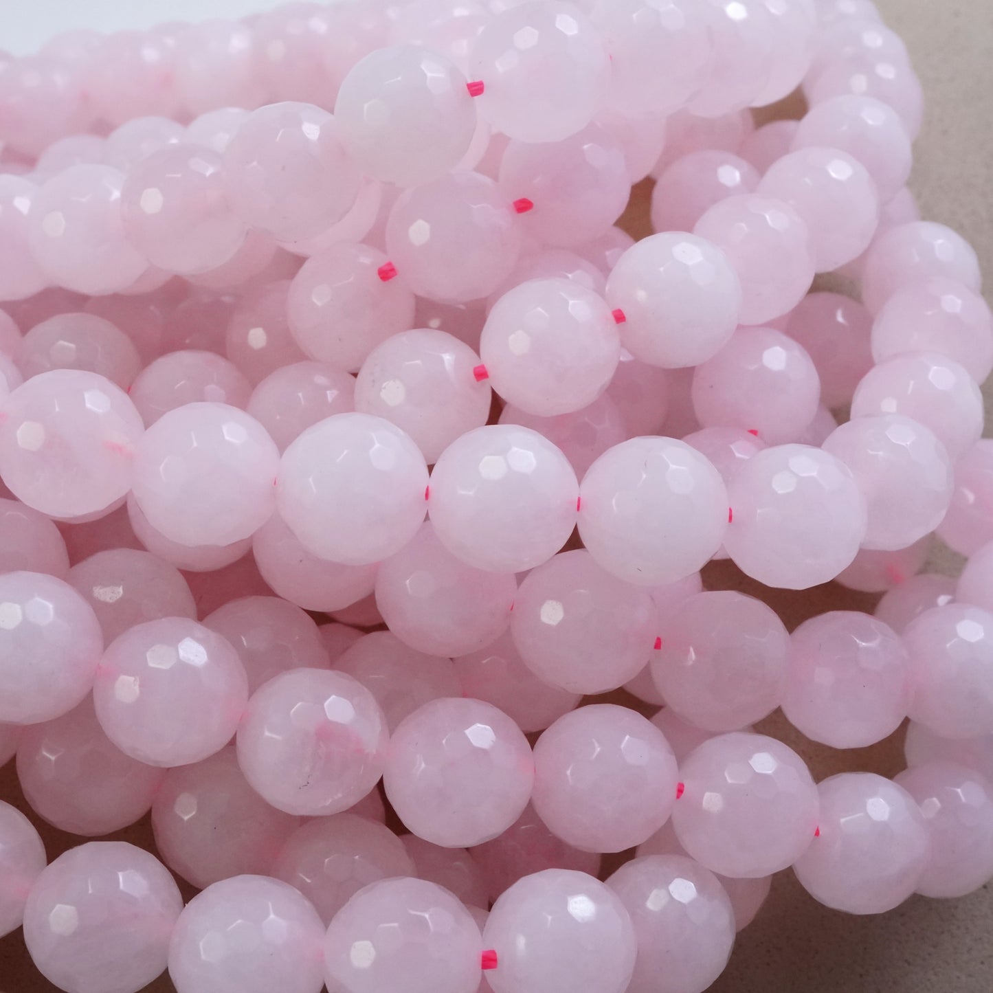 Rose Quartz (Round)(Faceted)(4mm)(6mm)(8mm)(10mm)(16"Strand)