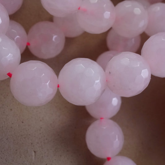 Rose Quartz (Round)(Faceted)(4mm)(6mm)(8mm)(10mm)(16"Strand)