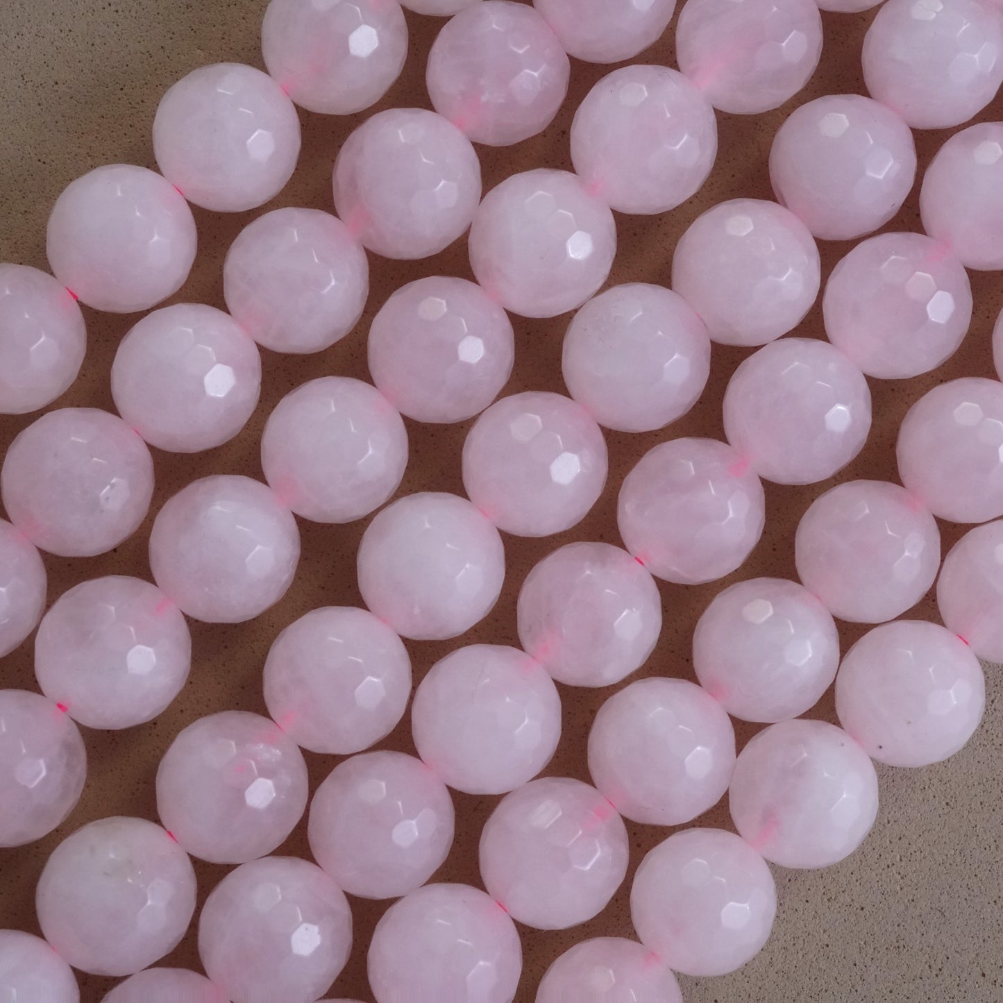 Rose Quartz (Round)(Faceted)(4mm)(6mm)(8mm)(10mm)(16"Strand)