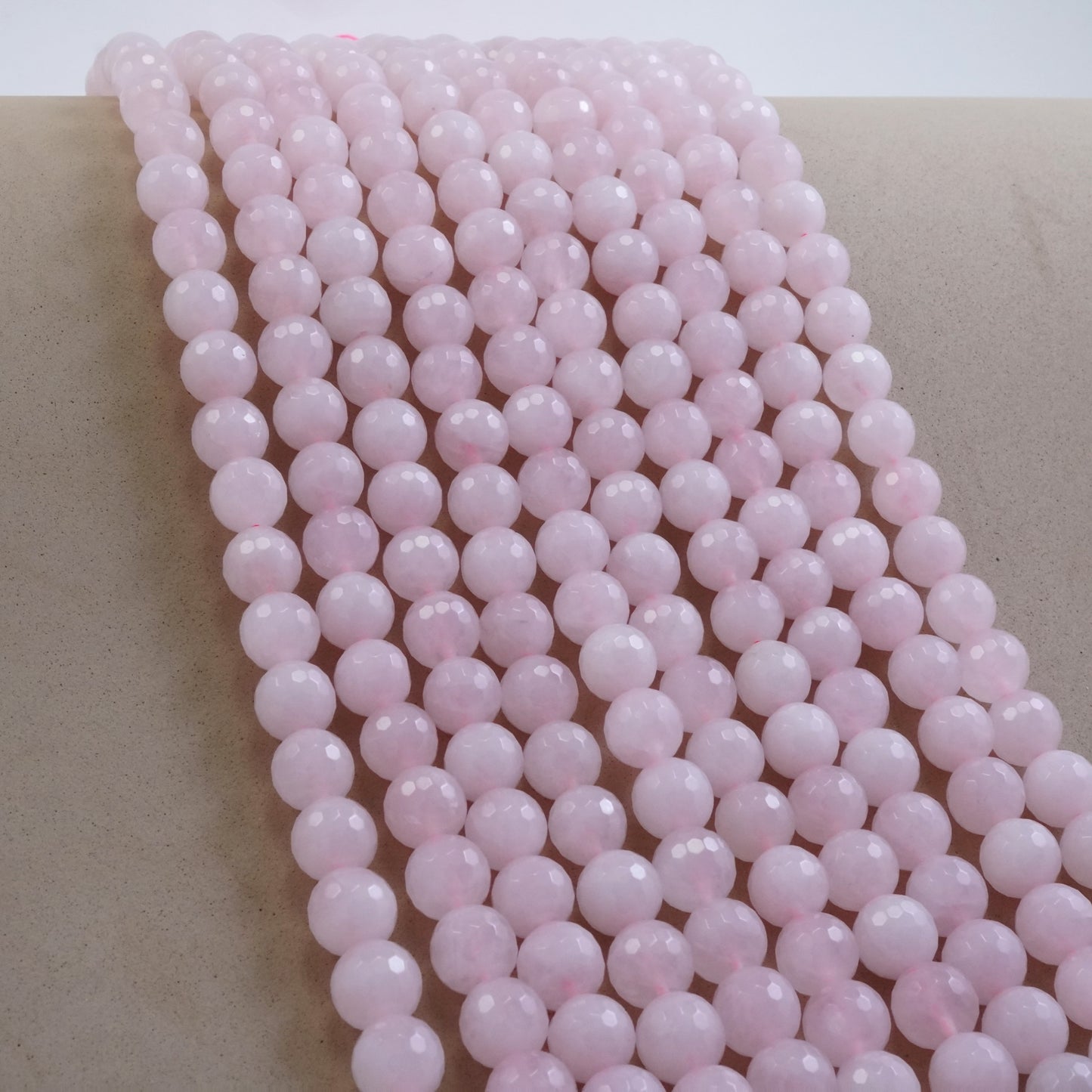 Rose Quartz (Round)(Faceted)(4mm)(6mm)(8mm)(10mm)(16"Strand)