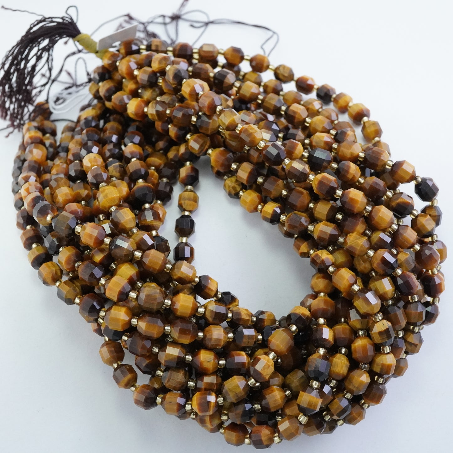 Tiger Eye (Barrel)(Faceted)(8x7mm)(16"Strand)