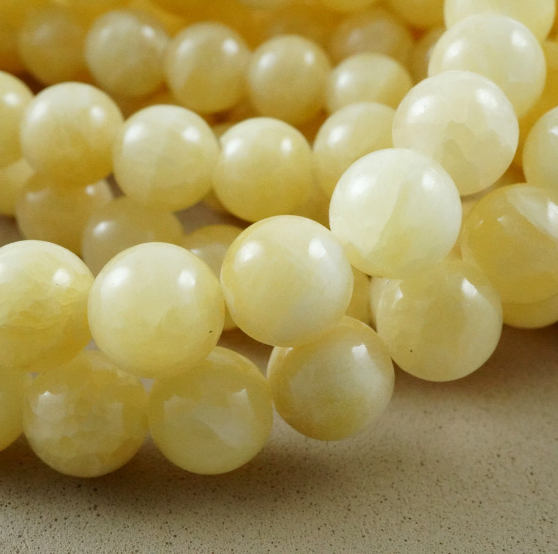 Yellow Calcite (Round)(Smooth) (4mm)(6mm)(8mm)(10mm)(16"Strand)