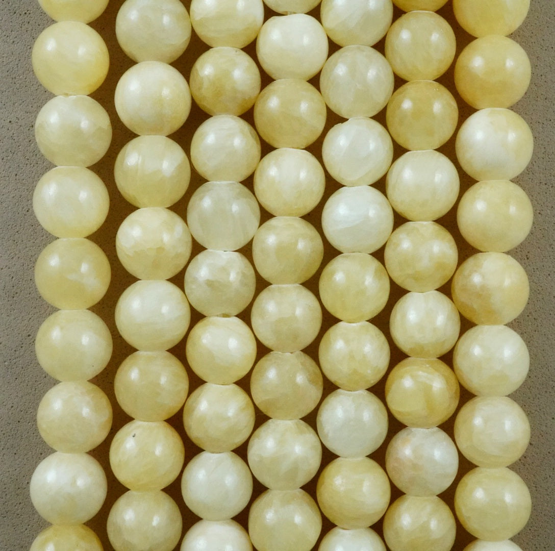 Yellow Calcite (Round)(Smooth) (4mm)(6mm)(8mm)(10mm)(16"Strand)