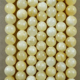 Yellow Calcite (Round)(Smooth)(6mm)(8mm)(10mm)(16"Strand)