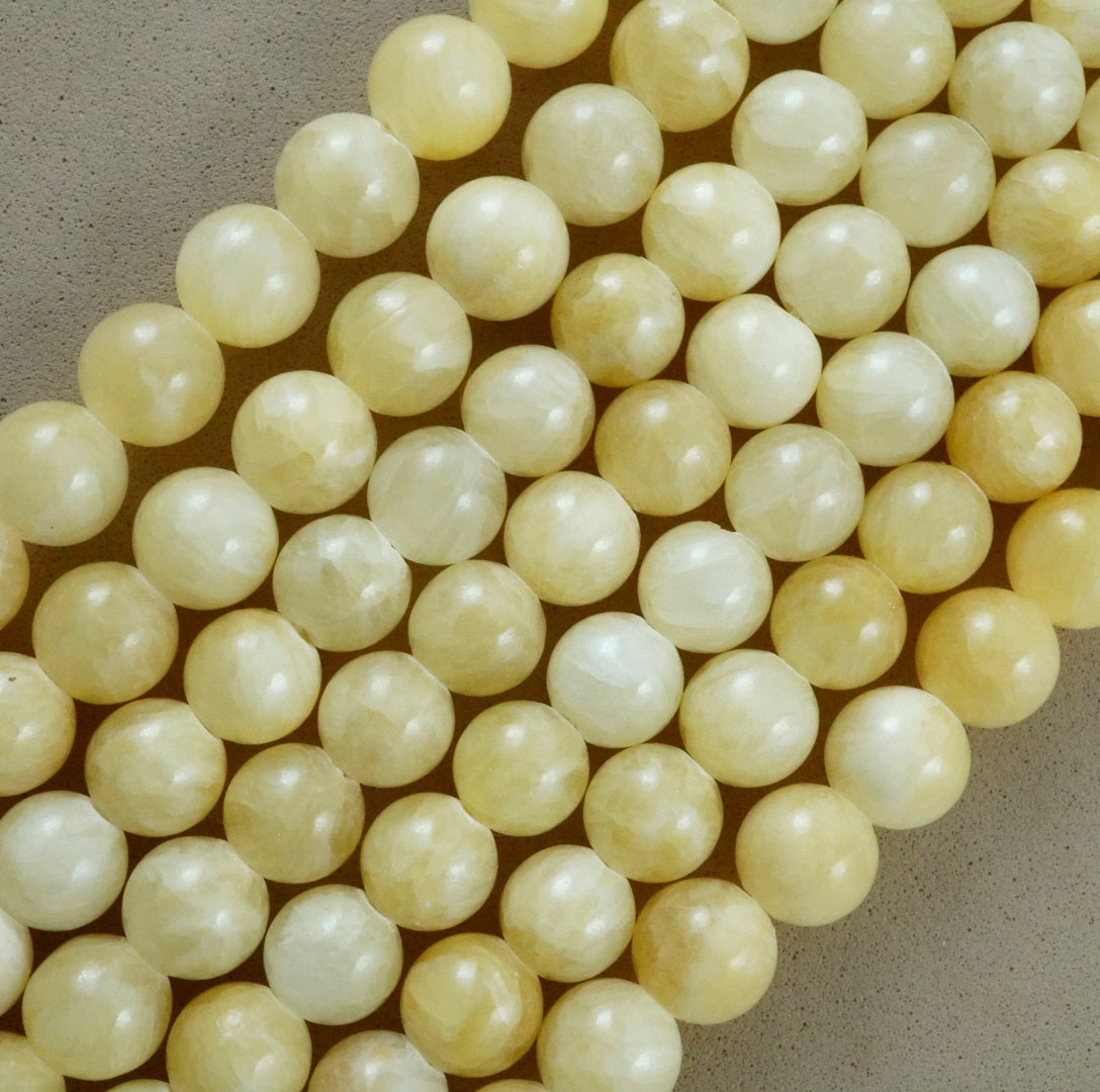 Yellow Calcite (Round)(Smooth) (4mm)(6mm)(8mm)(10mm)(16"Strand)