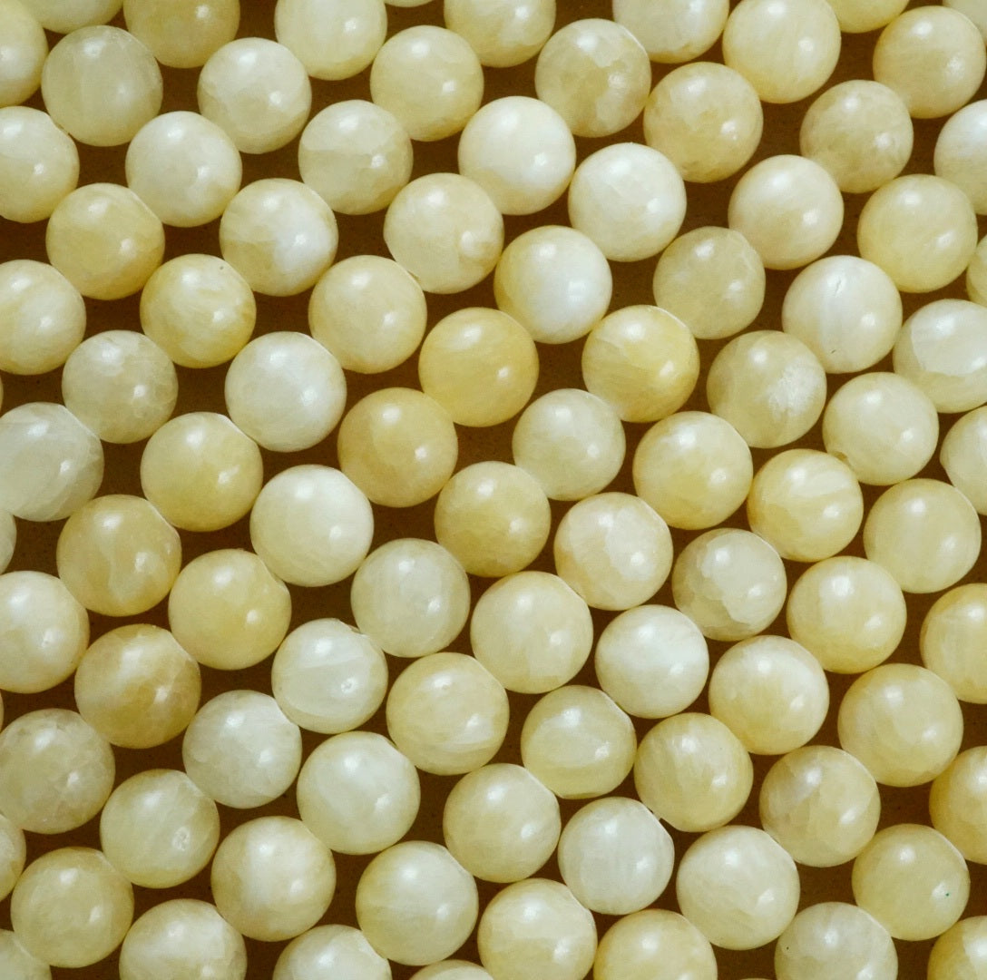 Yellow Calcite (Round)(Smooth) (4mm)(6mm)(8mm)(10mm)(16"Strand)