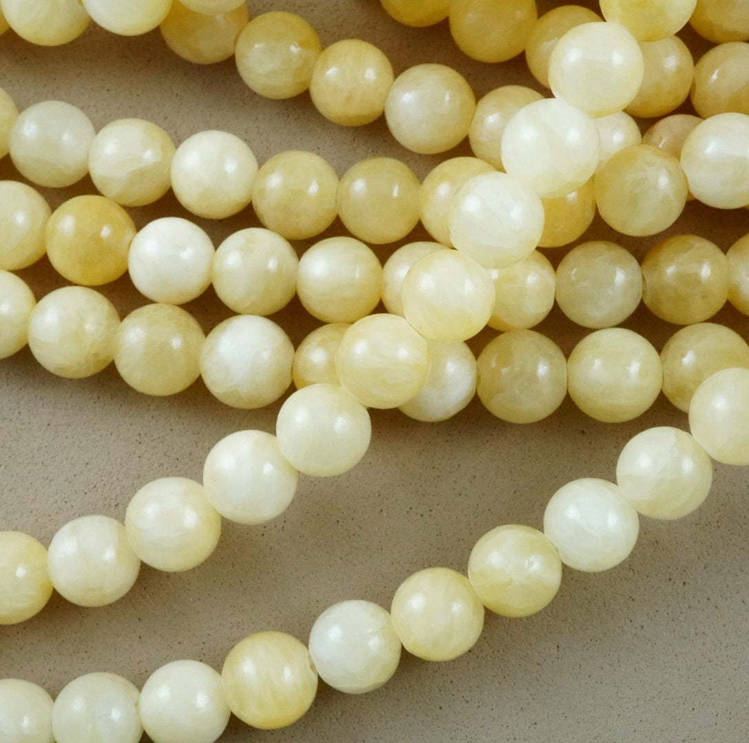 Yellow Calcite (Round)(Smooth) (4mm)(6mm)(8mm)(10mm)(16"Strand)