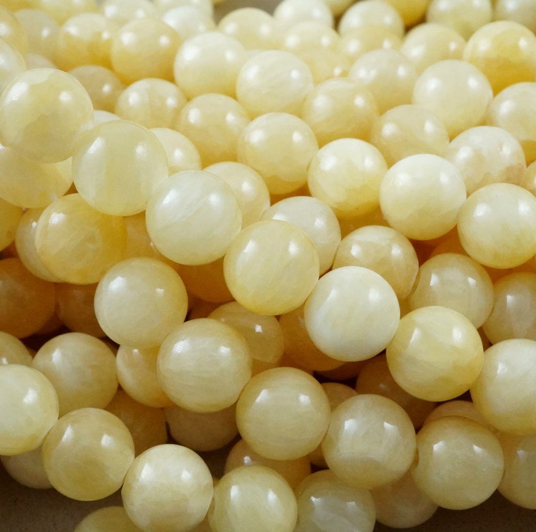 Yellow Calcite (Round)(Smooth) (4mm)(6mm)(8mm)(10mm)(16"Strand)