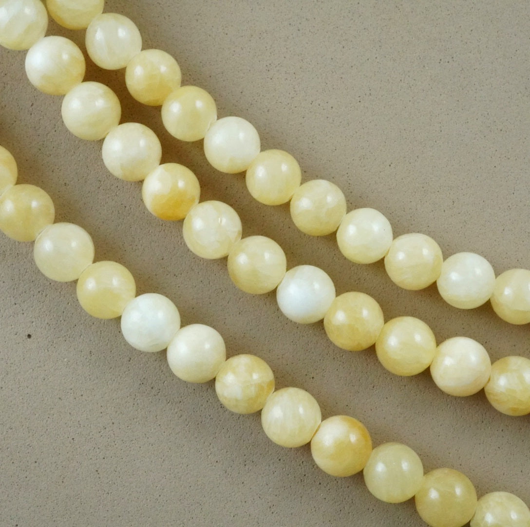 Yellow Calcite (Round)(Smooth) (4mm)(6mm)(8mm)(10mm)(16"Strand)