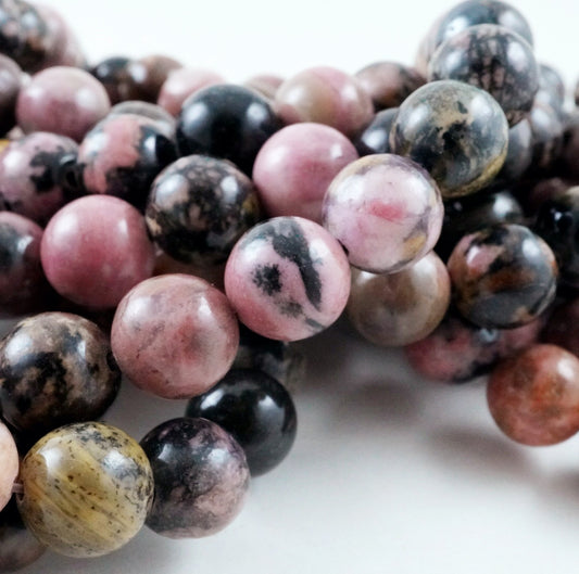 Rhodonite (Round)(Smooth)(4mm)(6mm)(8mm)(10mm)(12mm)(16"Strand)