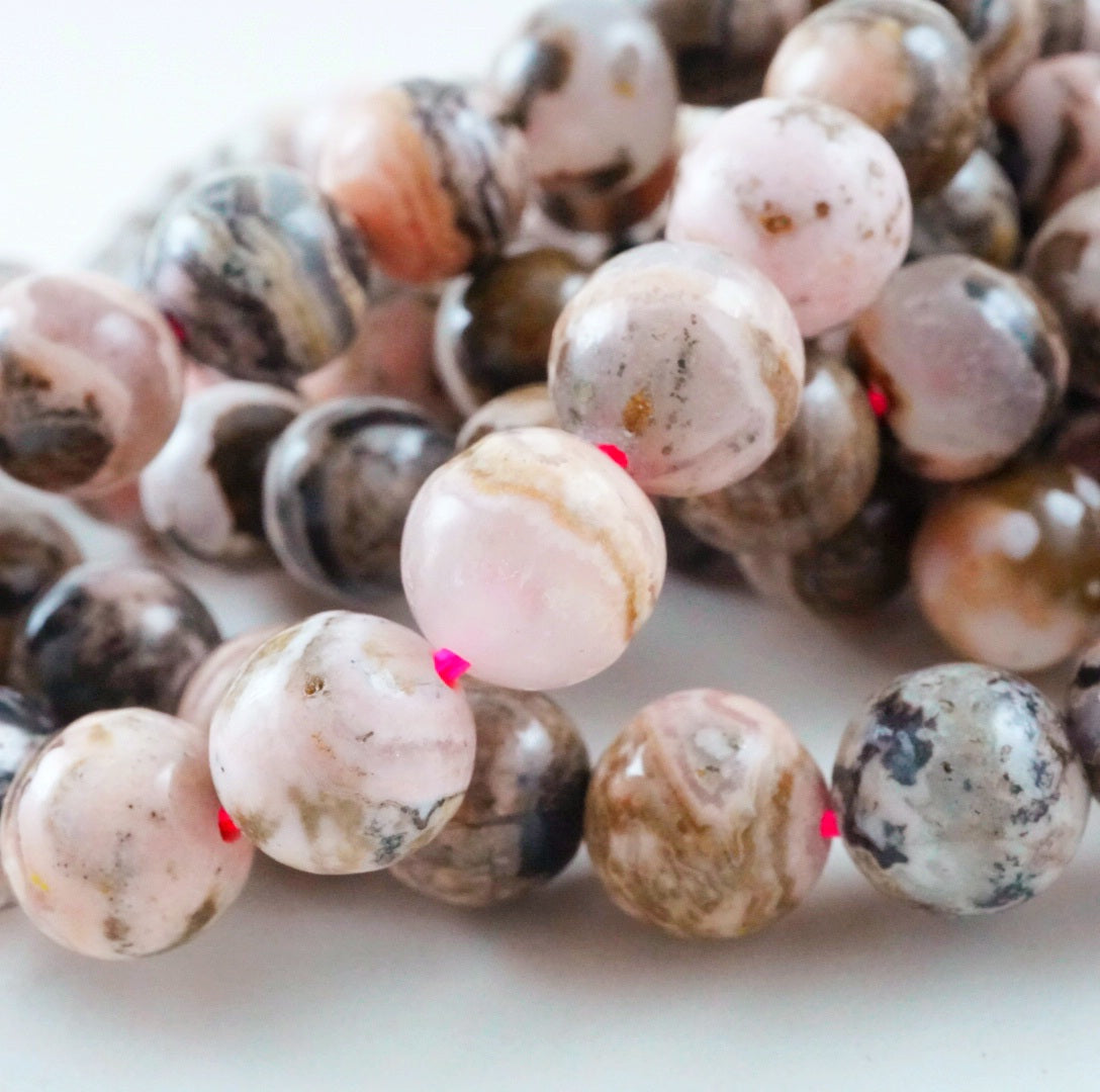 Chocolate Rhodochrosite (Round)(Smooth)(6mm)(8mm)(16"Strand)