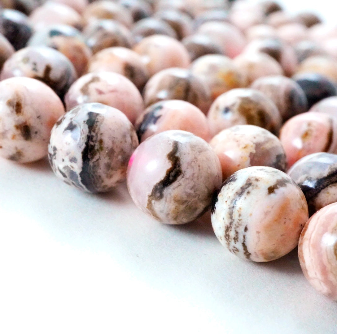 Chocolate Rhodochrosite (Round)(Smooth)(6mm)(8mm)(16"Strand)