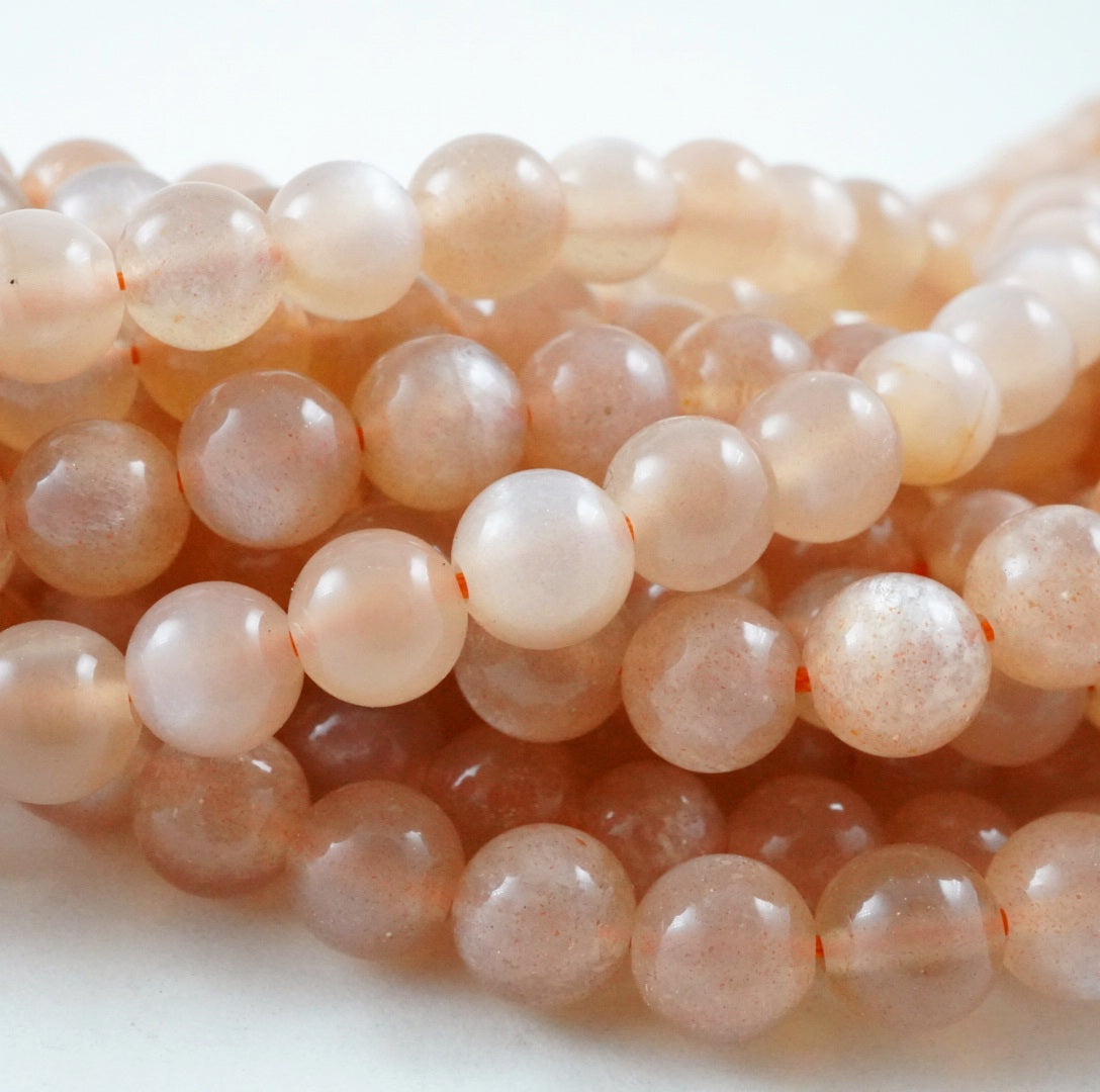 Peach Moonstone (Round)(Smooth)(4mm)(6mm)(8mm)(10mm)(12mm)(15"Strand)