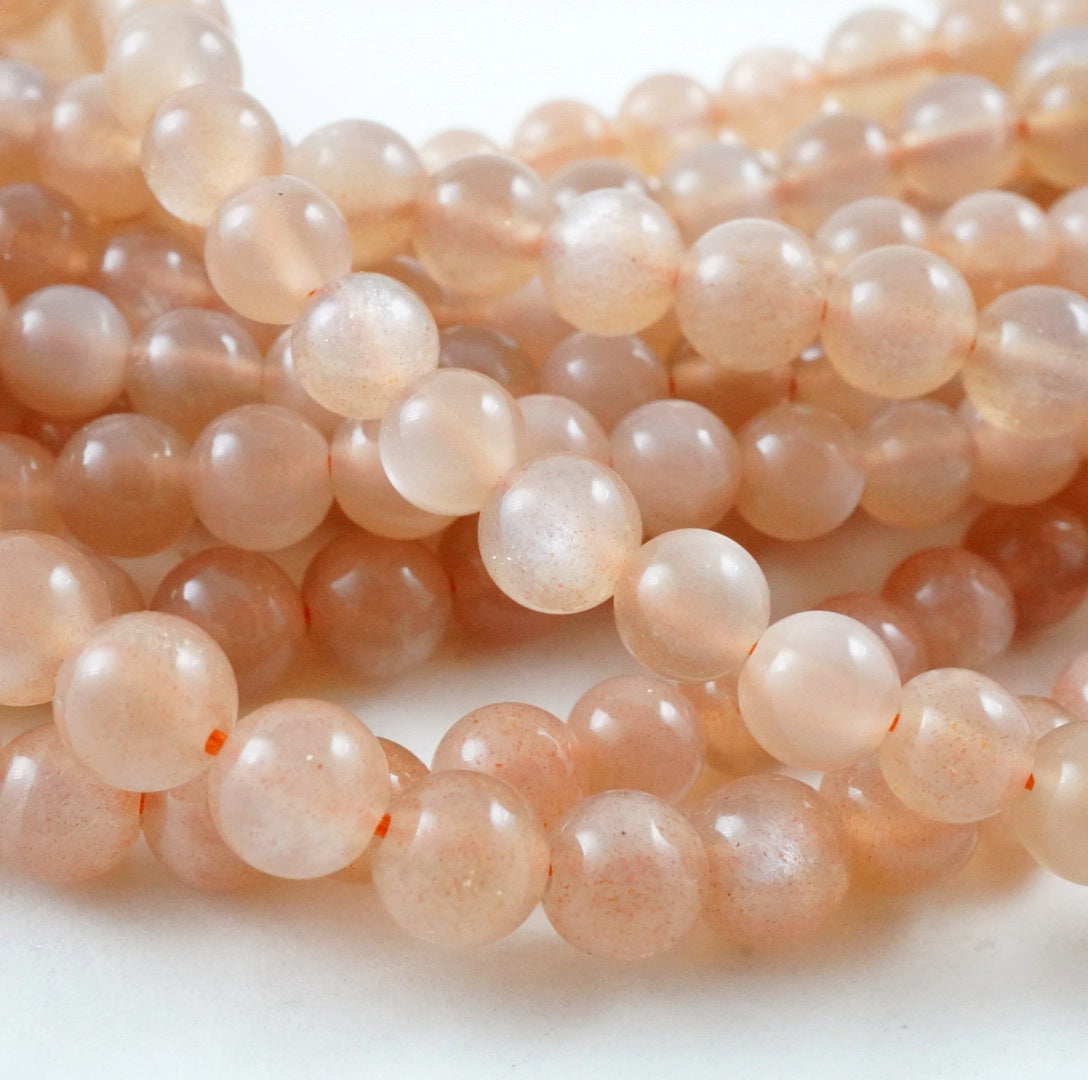 Peach Moonstone (Round)(Smooth)(4mm)(6mm)(8mm)(10mm)(12mm)(15"Strand)