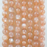 Peach Moonstone (Round)(Smooth)(4mm)(6mm)(8mm)(10mm)(12mm)(16"Strand)