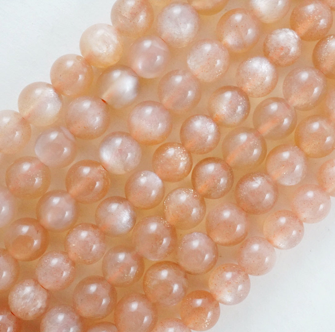 Peach Moonstone (Round)(Smooth)(4mm)(6mm)(8mm)(10mm)(12mm)(15"Strand)