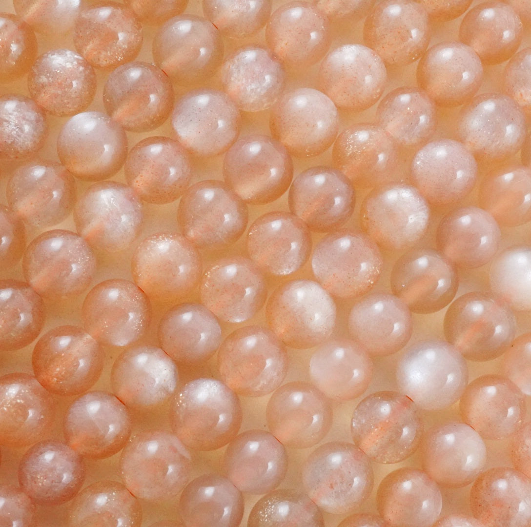 Peach Moonstone (Round)(Smooth)(4mm)(6mm)(8mm)(10mm)(12mm)(15"Strand)