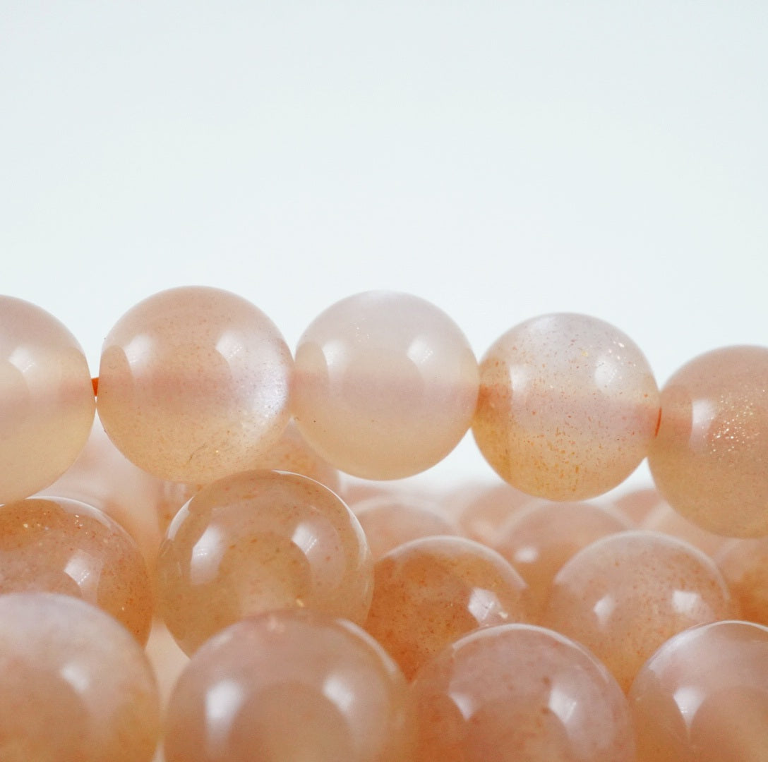 Peach Moonstone (Round)(Smooth)(4mm)(6mm)(8mm)(10mm)(12mm)(15"Strand)