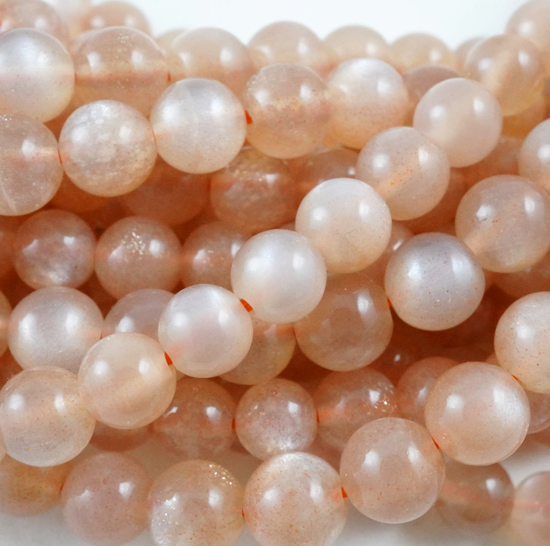 Peach Moonstone (Round)(Smooth)(4mm)(6mm)(8mm)(10mm)(12mm)(15"Strand)