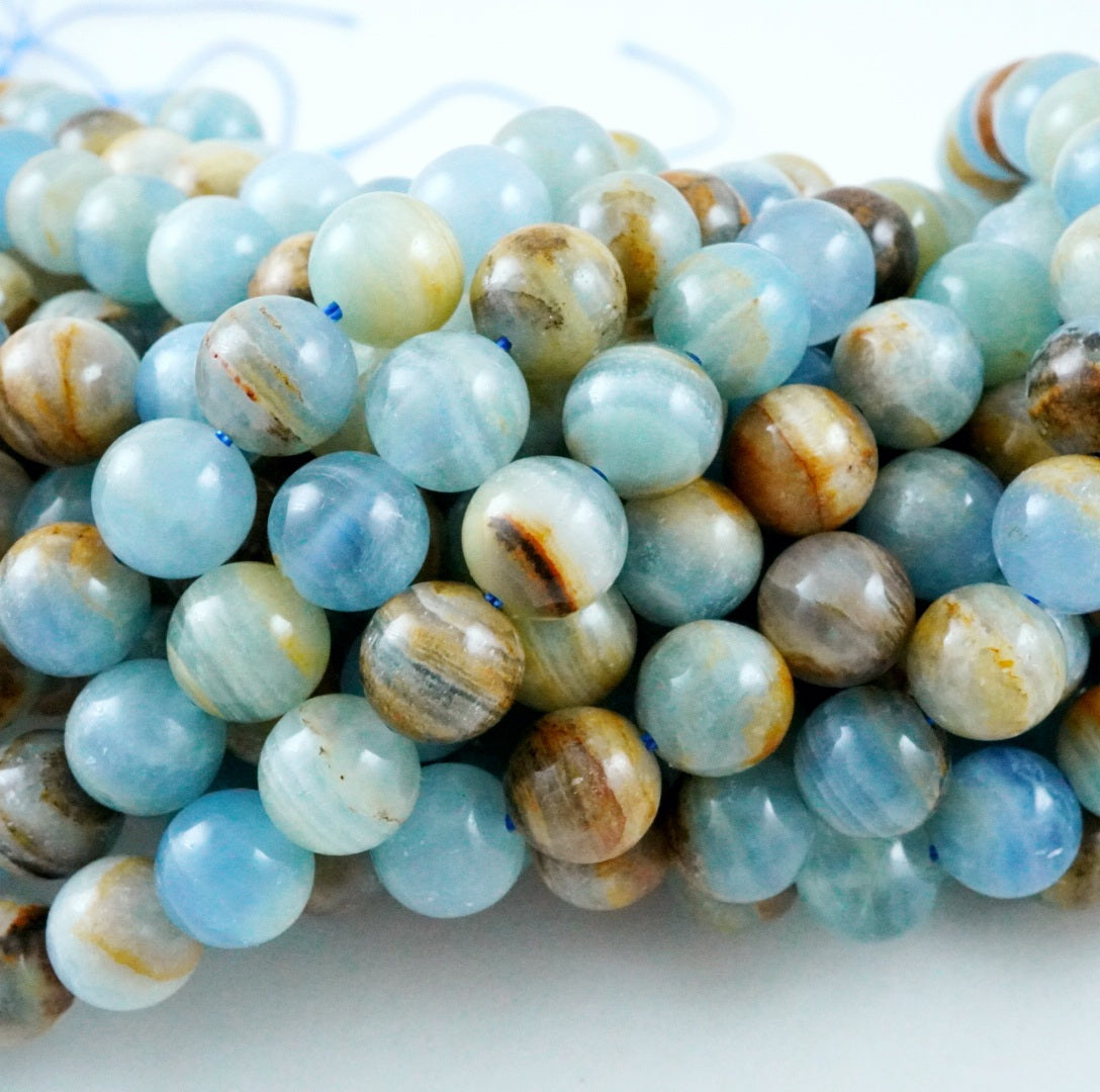 Blue Calcite (Round)(Smooth)(6mm)(8mm)(10mm)(16"Strand)