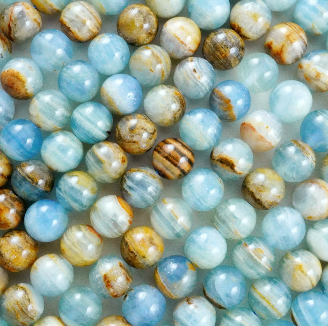 Blue Calcite (Round)(Smooth)(6mm)(8mm)(10mm)(16"Strand)