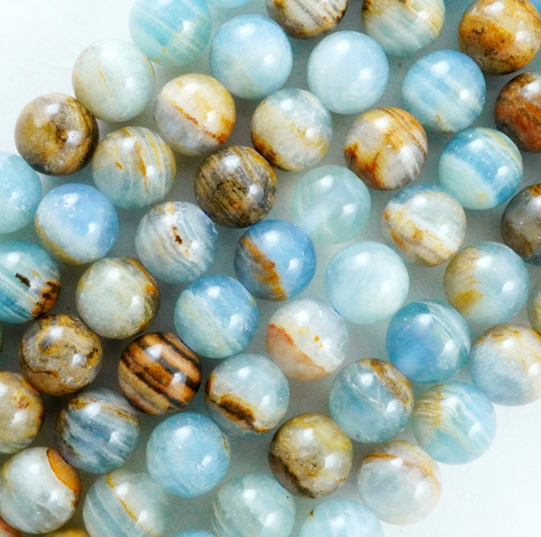 Blue Calcite (Round)(Smooth)(6mm)(8mm)(10mm)(16"Strand)