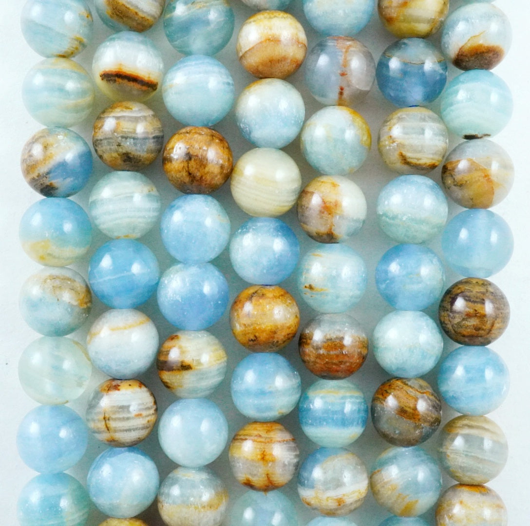 Blue Calcite (Round)(Smooth)(6mm)(8mm)(10mm)(16"Strand)