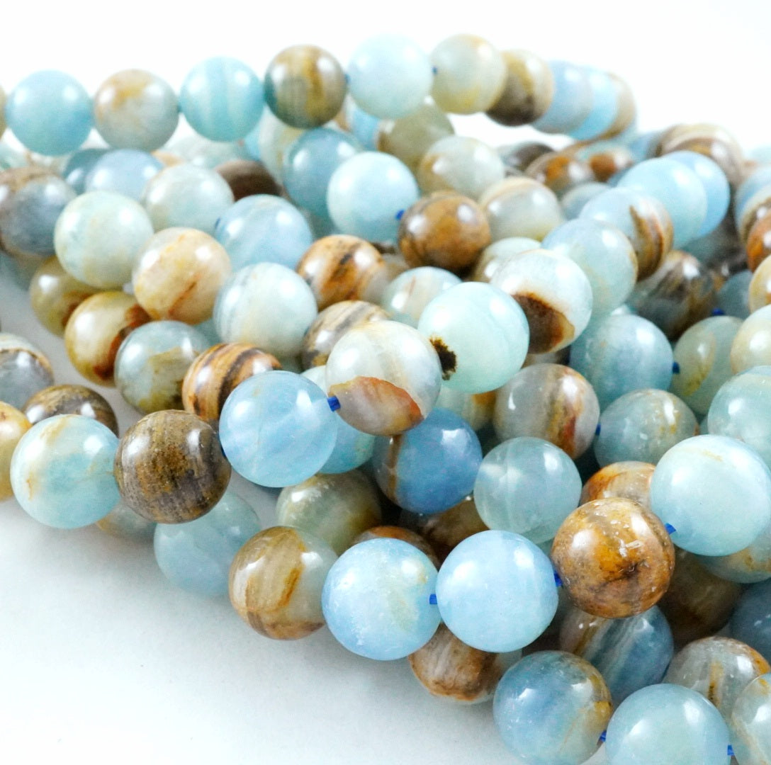 Blue Calcite (Round)(Smooth)(6mm)(8mm)(10mm)(16"Strand)