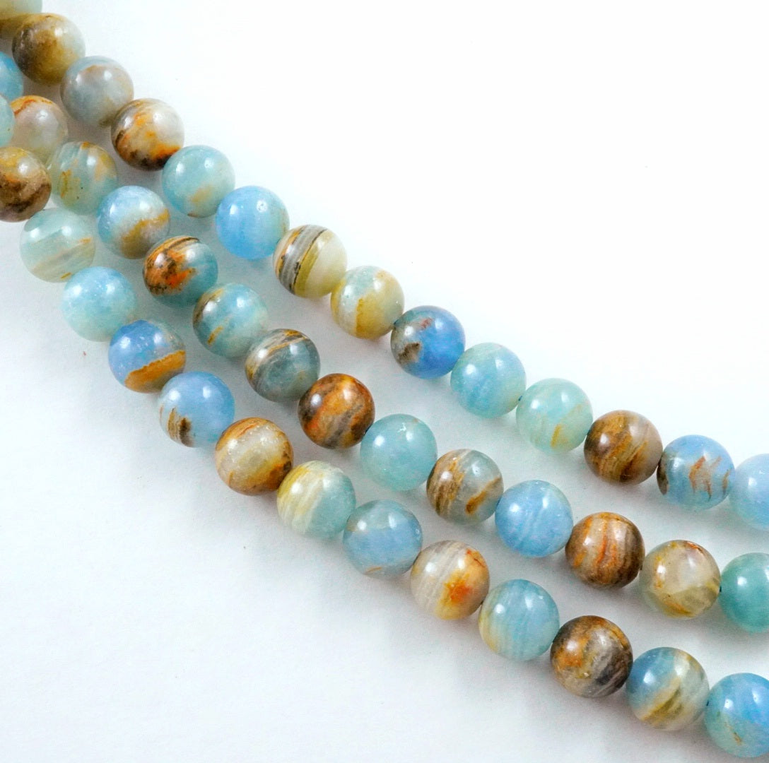 Blue Calcite (Round)(Smooth)(6mm)(8mm)(10mm)(16"Strand)