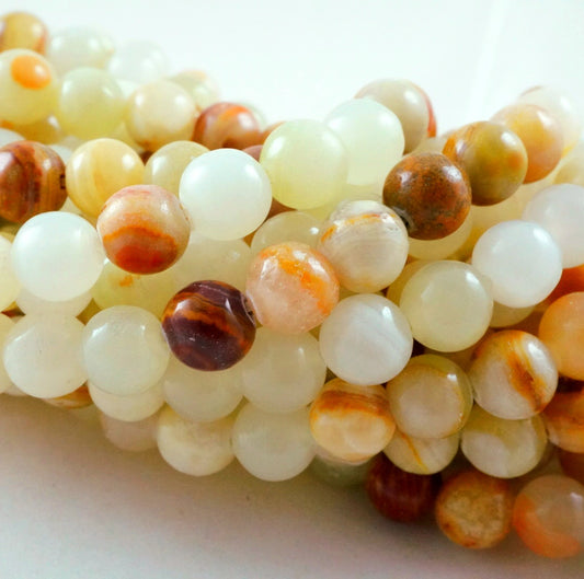 Cream Calcite (Round)(Smooth)(6mm)(8mm)(10mm)(16"Strand)