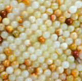 Cream Calcite (Round)(Smooth)(6mm)(8mm)(10mm)(16"Strand)