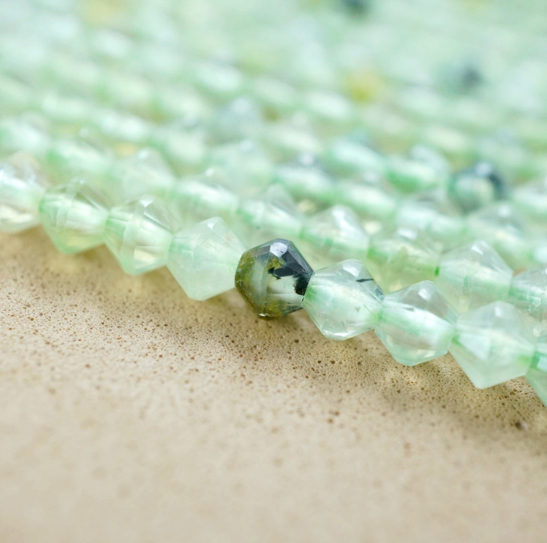 Prehnite (Bicone)(Micro)(Faceted)(4mm)(15.5"Strand)