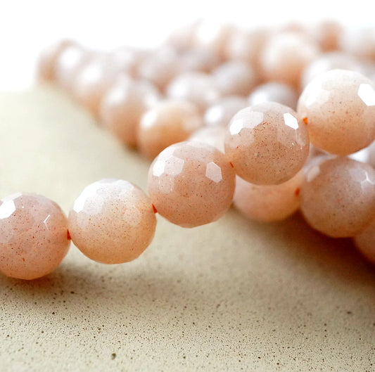 Peach Moonstone (Round)(Faceted)(6mm)(8mm)(16"Strand)