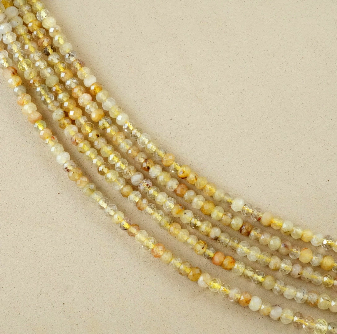 Golden Rutilated Quartz (Rondelle)(Faceted)(6x4mm)(15.5"Strand)