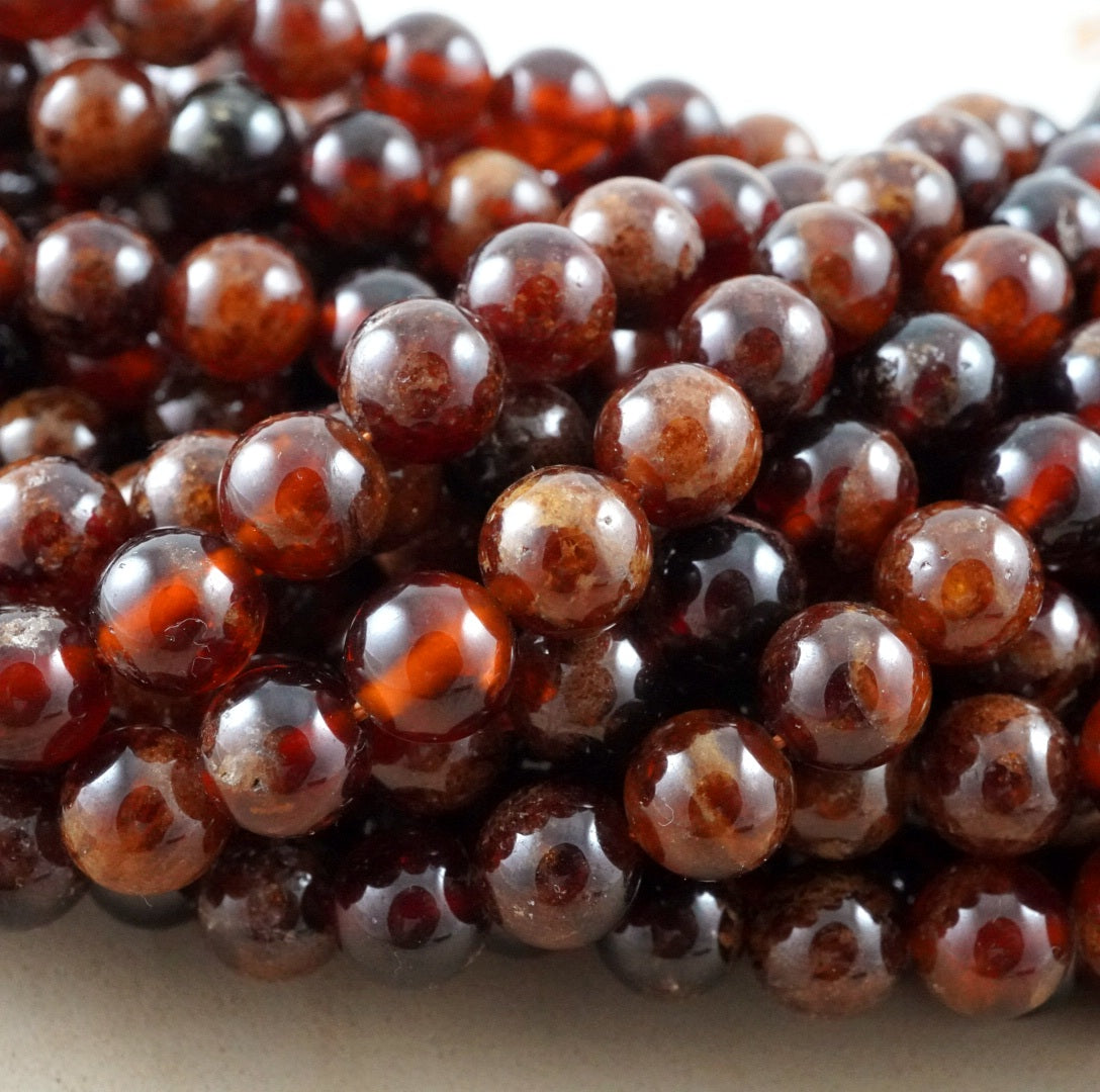 Hessonite Garnet (Round)(Smooth)(4mm)(6mm)(8mm)(10mm)(16"Strand)