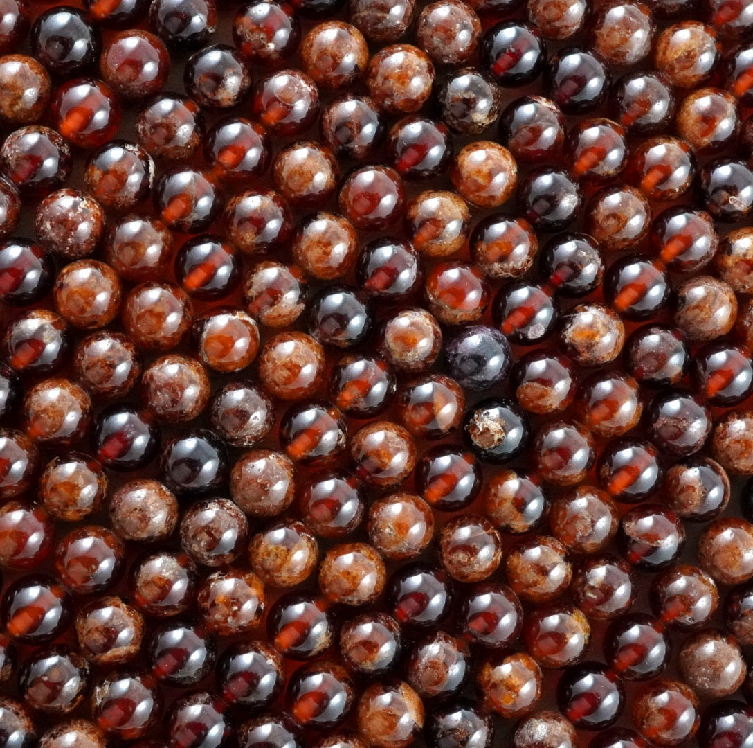 Hessonite Garnet (Round)(Smooth)(4mm)(6mm)(8mm)(10mm)(16"Strand)