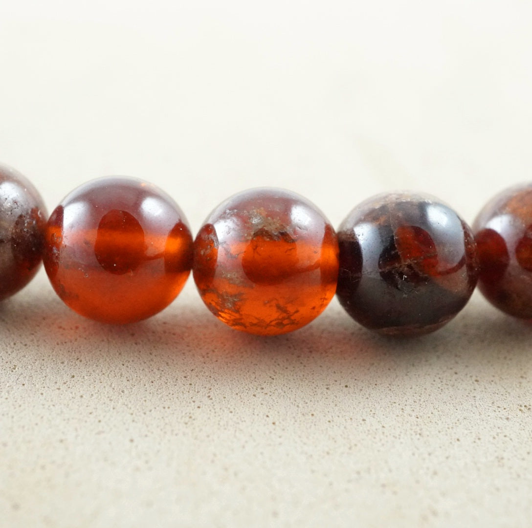 Hessonite Garnet (Round)(Smooth)(4mm)(6mm)(8mm)(10mm)(16"Strand)