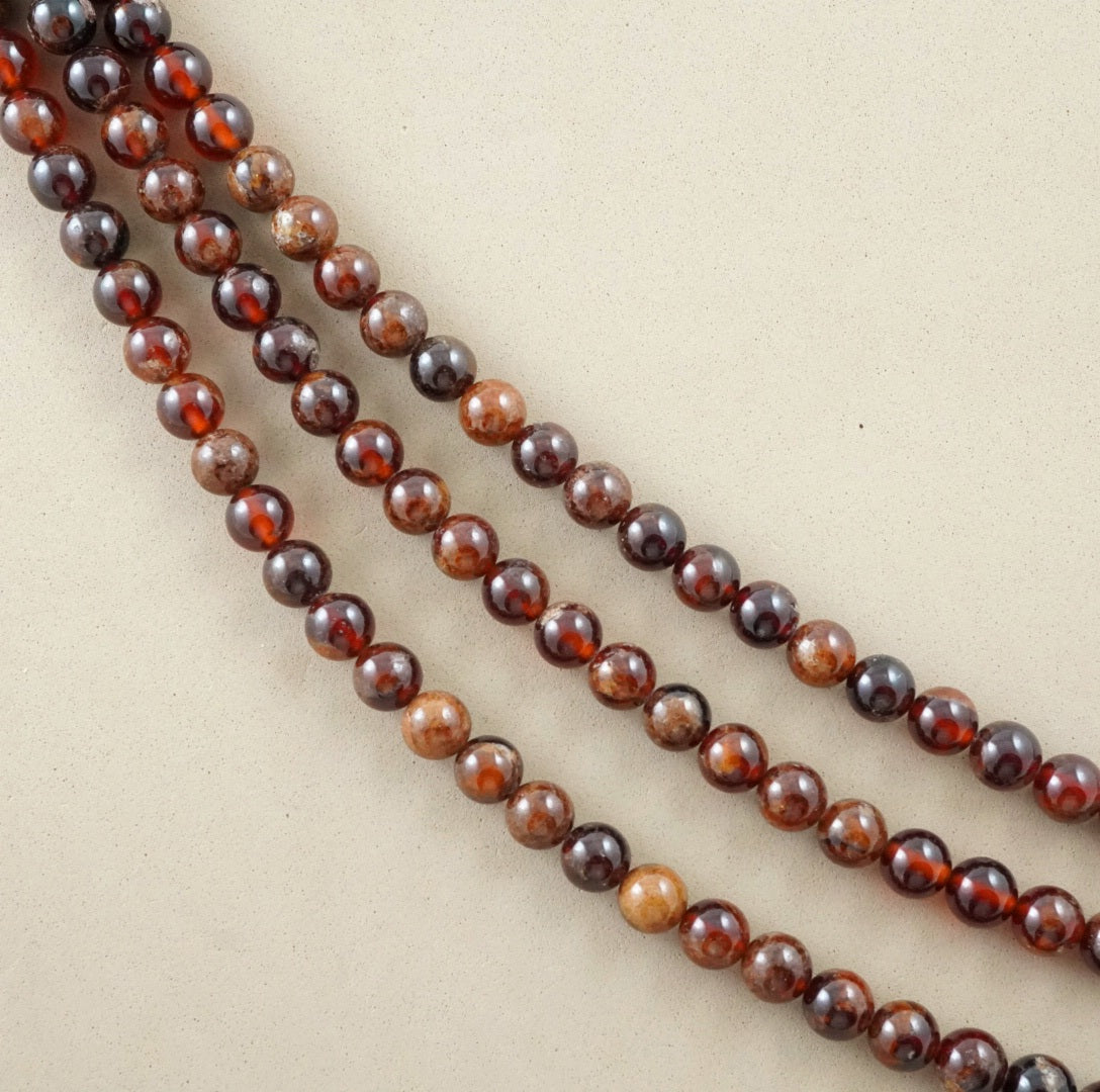 Hessonite Garnet (Round)(Smooth)(4mm)(6mm)(8mm)(10mm)(16"Strand)