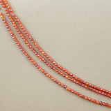Cubic Zirconia (Round)(Faceted)(Orange)(Dyed)(2mm)(4mm)(16"Strand)