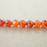 Cubic Zirconia (Round)(Faceted)(Orange)(Dyed)(2mm)(4mm)(16"Strand)