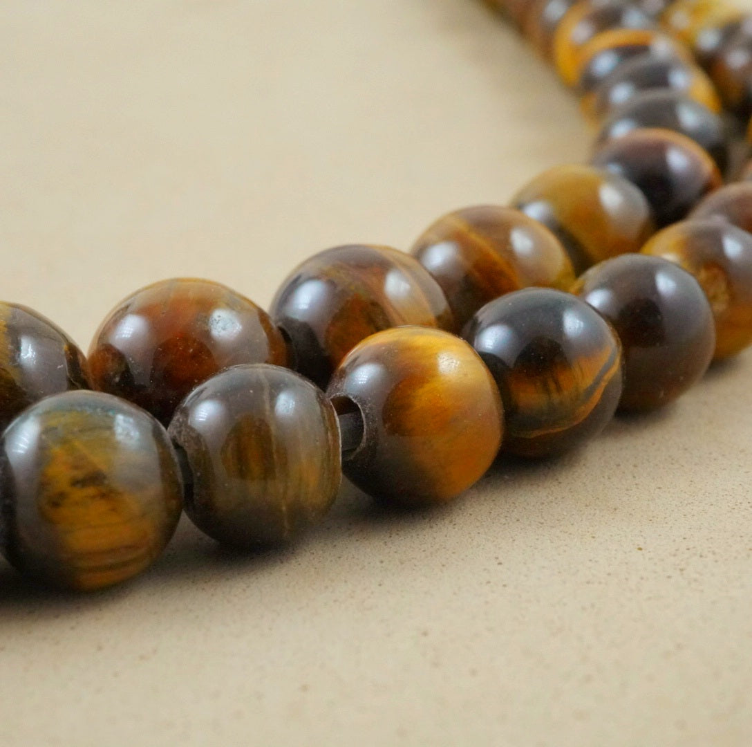 Tiger Eye (Large Hole)(Round)(Smooth)(8mm)(10mm)(8"Strand)