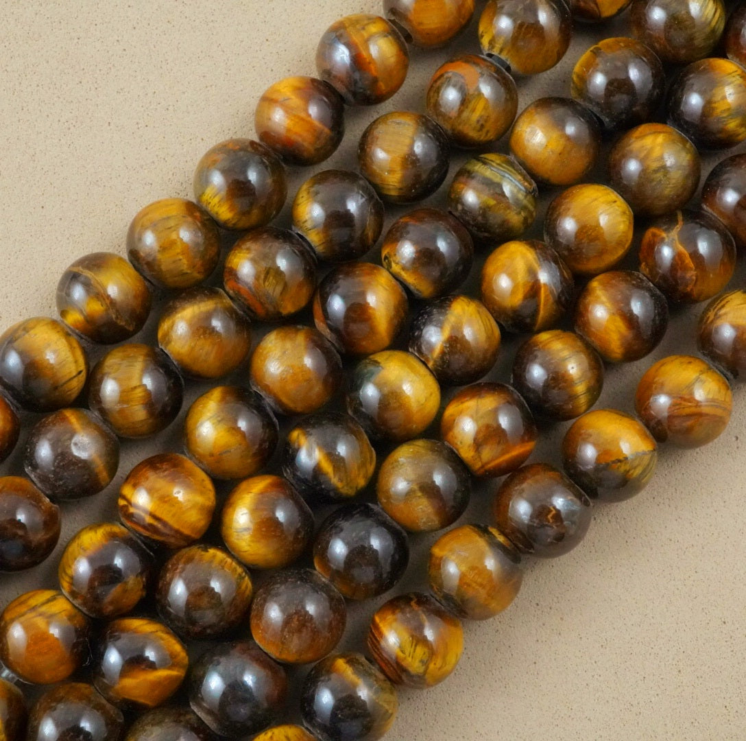 Tiger Eye (Large Hole)(Round)(Smooth)(8mm)(10mm)(8"Strand)