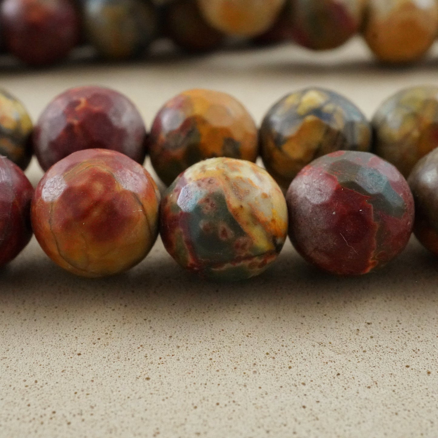 Red Creek Jasper (Round)(Faceted)(4mm)(6mm)(8mm)(10mm)(12mm)(16"Strand)