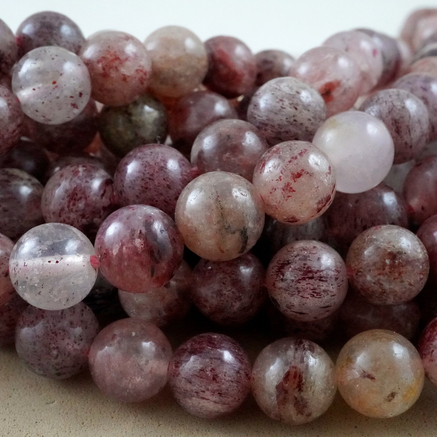 Strawberry Quartz (Round)(Smooth)(4mm)(6mm)(8mm)(10mm)(16"Strand)