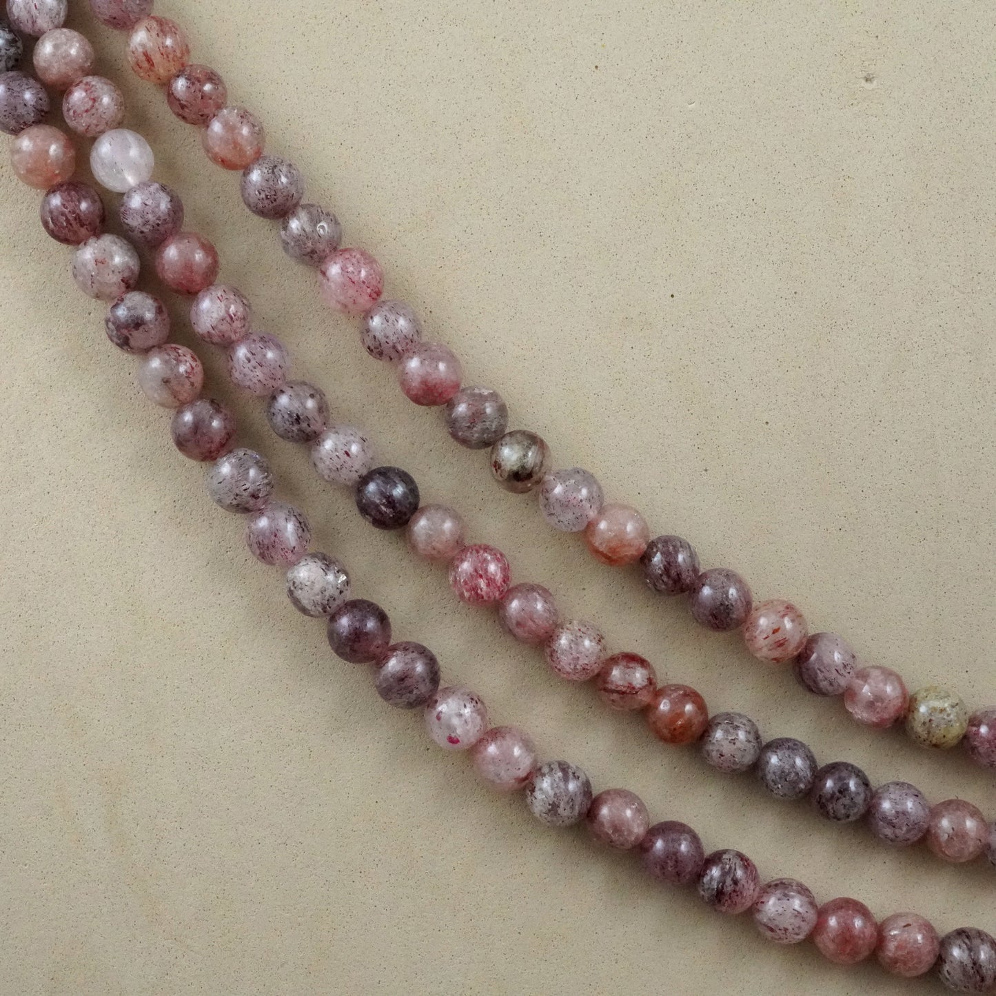 Strawberry Quartz (Round)(Smooth)(4mm)(6mm)(8mm)(10mm)(16"Strand)